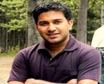 Dr.  Dhiman Bhattacharyya